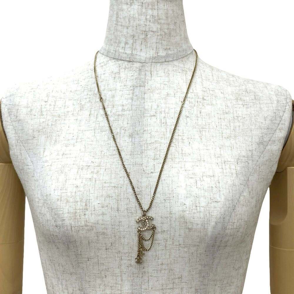 CHANEL Authentic Pink Pearl Logo Necklace